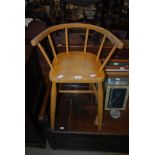 AN ERCOL TYPE SPINDLE BACK CHILDS TALL CHAIR