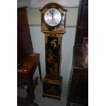 AN EARLY 20TH CENTURY BLACK LACQUER CHINOISERIE GRANDMOTHER CLOCK WITH SILVERED ARABIC NUMERAL DIAL