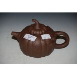 A YIXING GOURD FORM TEAPOT AND COVER