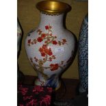 A CHINESE WHITE GROUND CLOISONNE VASE ON CARVED AND PIERCED HARDWOOD STAND