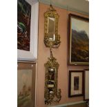 A PAIR OF BRASS TWO LIGHT MIRROR BACK GIRONDELLES