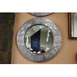 ARTS AND CRAFTS PEWTER FRAMED CIRCULAR WALL MIRROR WITH THE FRAME EMBOSSED WITH FIVE PETALED