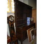 19TH CENTURY OAK DRESSER WITH UPRIGHT OPEN BACK, THE BASE WITH THREE DRAWERS FLANKED BY PANELLED