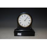 A 19TH CENTURY EBONISED MANTLE CLOCK WITH BLACK AND WHITE ROMAN NUMERAL DIAL