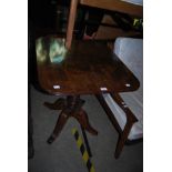A 19TH CENTURY MAHOGANY SQUARE OCCASIONAL TABLE ON FOUR DOWNSWEPT SUPPORTS