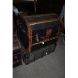 A NEAR PAIR OF WOOD AND LEATHER CANVAS DOME TOP TRUNKS TOGETHER WITH A VINTAGE CABIN TRUNK