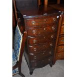 A REPRODUCTION MAHOGANY TALL SLIM BOWFRONT CHEST OF SIX DRAWERS