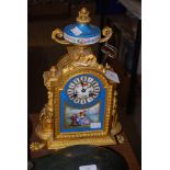 LATE 19TH/ EARLY 20TH CENTURY FRENCH GILT, BRONZE AND BLUE SEVRES STYLE PORCELAIN MANTEL CLOCK,
