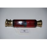 A WHITE METAL MOUNTED RUBY GLASS DOUBLE ENDED SCENT BOTTLE