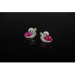 PAIR OF ART DECO STYLE WHITE METAL RUBY AND DIAMOND SET COCKTAIL EARRINGS, EACH SET WITH A PAIR OF