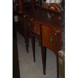 A GEORGE III STYLE REPRODUCTION MAHOGANY AND BOXWOOD LINED SERPENTINE SIDEBOARD