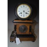 19TH CENTURY WALNUT AND EBONY CASED MANTLE CLOCK WITH CIRCULAR ROMAN NUMERAL DIAL AND TWIN TRAIN