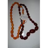 STRING OF GRADUATED BUTTERSCOTCH AMBER BEADS, GROSS WEIGHT 34.7 GRAMS, TOGETHER WITH ANOTHER