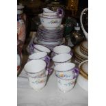 AN ART DECO ROYAL STAFFORD FLORAL TEA SERVICE, COMPRISING TWELVE CUPS, SAUCERS, PLATES AND TWO