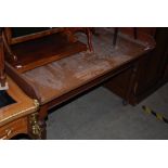 A 19TH CENTURY OAK WASHSTAND ON TAPERED CYLINDRICAL SUPPORTS WITH LATER LAMINATETOP