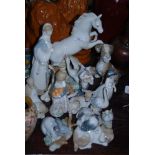 A COLLECTION OF CHILDREN AND ANIMAL FIGURES INCLUDING LLADRO AND NAO