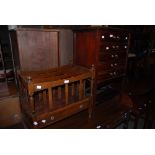 AN EARLY 20TH CENTURY MAHOGANY MUSIC CABINET WITH FIVE DRAWERS ON SQUARE TAPERED LEGS WITH LOWER