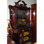 AN EDWARDIAN MAHOGANY MIRROR BACK CHIFFONIER