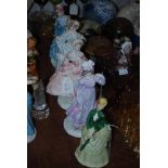 A GROUP OF FIVE ROYAL WORCESTER PORCELAIN LADY FIGURES, INCLUDING SEVERAL OF THE VICTORIA AND ALBERT