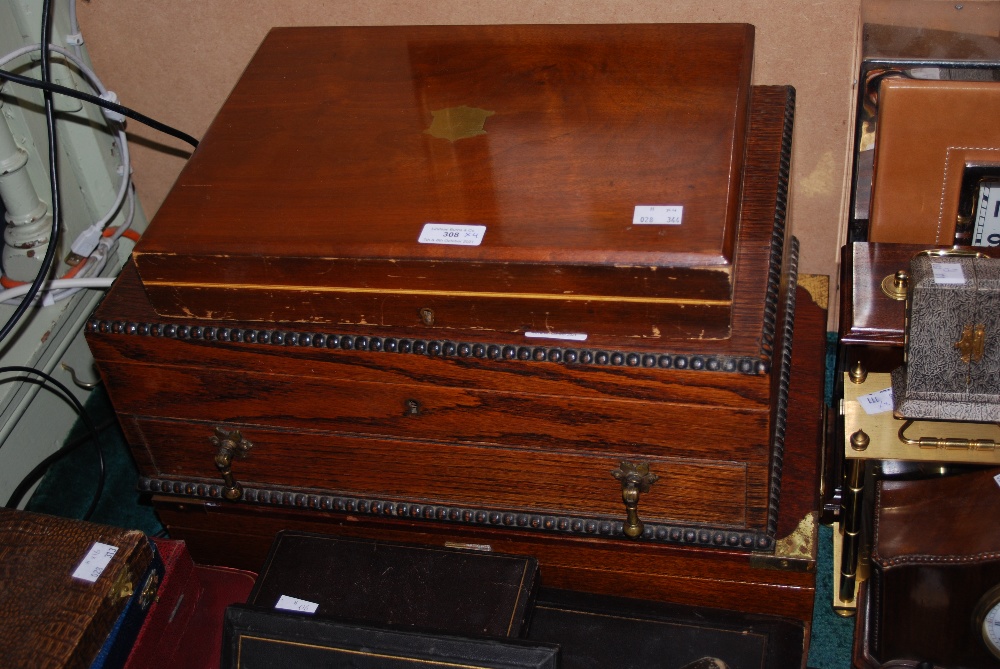 FOUR WOODEN BOXES INCLUDING AN EARLY 20TH CENTURY MAHOGANY FLATWARE BOX, A SMALLER EARLY 20TH