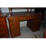 A VICTORIAN OAK PEDESTAL DESK