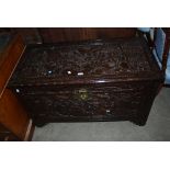 CHINESE CAMPHOR WOOD BLANKET BOX, CARVED IN RELIEF WITH WARRIORS AND PINE TREES