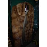 A VINTAGE FUR COAT