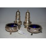 PAIR OF LONDON SILVER PEPPER POTS, TOGETHER WITH A PAIR OF ELECTROPLATED SALTS WITH BLUE GLASS