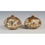 A PAIR OF JAPANESE SATSUMA POTTERY VASES, MEIJI PERIOD, THE COMPRESSED OVIFORM BODIES DECORATED WITH