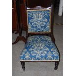 A VICTORIAN MAHOGANY FLORAL UPHOLSTERED PARLOUR CHAIR
