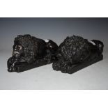 PAIR OF BRONZED RECUMBENT LIONS