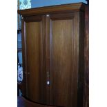 A LATE 19TH / EARLY 20TH CENTURY PINE TWO DOOR WARDROBE