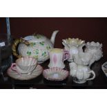 COLLECTION OF BELLEEK IRISH PORCELAIN TO INCLUDE A SHAMROCK DECORATED TEAPOT AND COVER, SHELL SHAPED