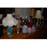 A COLLECTION OF TABLE LAMPS INCLUDING TWO CHINESE STYLE VASES, ONE IN BLUE CRACKLE GLAZE, THE