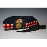 A VINTAGE GLENGARRY CAP WITH BRASS BADGE FOR GRENADIER GUARDS