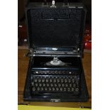A ROYAL BLACK ENAMEL TYPEWRITER IN A CARRY CASE CIRCA 1940-1950
