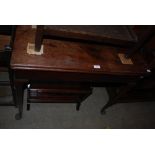 A GEORGE III MAHOGANY GAMES TABLE, THE FOLD OVER RECTANGULAR TOP OPENING TO A GREEN BAIZE LINE