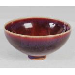 A CHINESE PORCELAIN FLAMBE FOOTED BOWL, OF TAPERED CYLINDRICAL FORM, 8.5CM