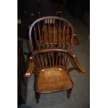 A LATE 19TH / EARLY 20TH CENTURY HIGH BACKED WINDSOR CHAIR, PROBABLY ELM AND FRUITWOOD