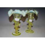 A PAIR OF VICTORIAN VASELINE GLASS FRILLED RIM FLOWER VASES