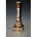 A JAPANESE SATSUMA POTTERY BOTTLE VASE DECORATED WITH BOYS, BUTTERFLIES AND FLOWERS.