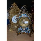 TWO EARLY 20TH CENTURY FRENCH MANTEL CLOCKS, ONE IN GILT BRONZE, THE OTHER IN CHAMPELEVE ENAMEL.