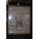 A 19TH CENTURY SAMPLER CONTAINING THE ALPHABET, NUMBERS, INITIALS AND A SCENE OF A HOUSE IN A GARDEN