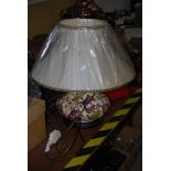 A MODERN LARGE MOORCROFT TABLE LAMP WITH STYLISED FLORAL DECORATION TO THE BODY ON CREAM GROUND WITH