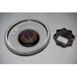 A MILLEFIORI GROUND CLEAR GLASS PAPERWEIGHT DISH TOGETHER WITH A MILLEFIORI AND SPIRAL CANE STAR