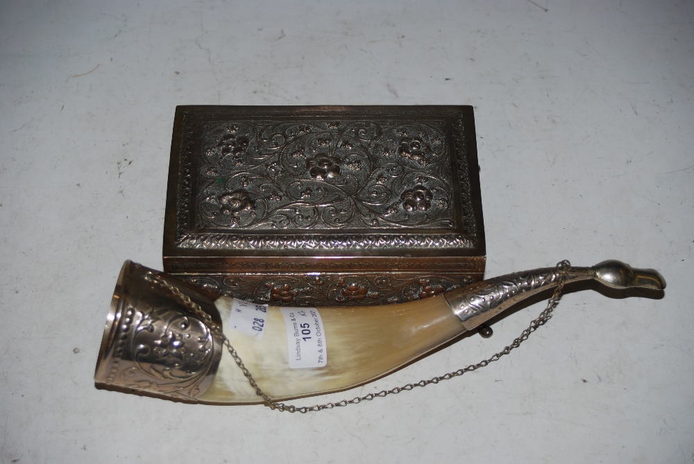 A WHITE METAL MOUNTED HORN TOGETHER WITH A WHITE METAL RECTANGULAR FLORAL EMBOSSED TABLE CASKET