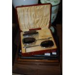 A SILVER AND TORTOISESHELL DRESSING TABLE SET IN A BOX, TOGETHER WITH A BOXED SET OF TWELVE SILVER