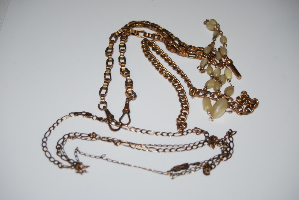 FOUR ASSORTED YELLOW METAL NECKLACES