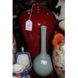 A SANG-DE-BOEUF MEIPING VASE TOGETHER WITH A MODERN CHINESE CELADON GLAZED LONG NECK VASE