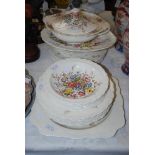 AN EARLY 20TH CROWN DUCAL WILMSLOW PATTERN DINNER SERVICE INCLUDING ASHET, TUREEN AND FOUR SIZES